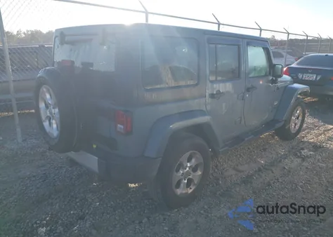 2015 Jeep Wrangler Unlimited Sahara z USA, uszkodzony, nr VIN 1C4HJWEG7FL662657